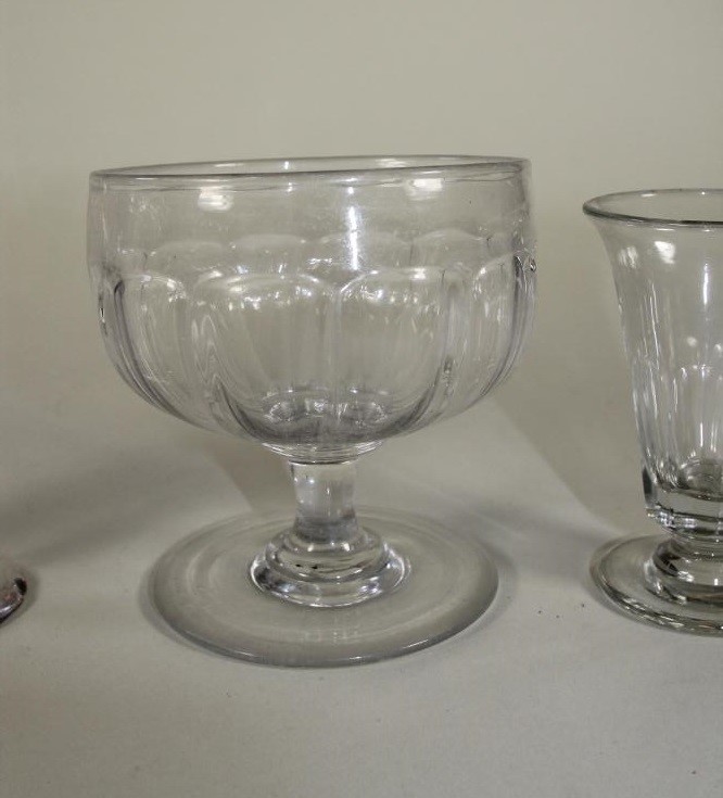 FOUR GEORGIAN AND LATER GLASSES comprising a "Somerset Ale" with wrythen fluted conical bowl Image