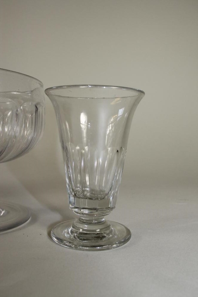 FOUR GEORGIAN AND LATER GLASSES comprising a "Somerset Ale" with wrythen fluted conical bowl Image