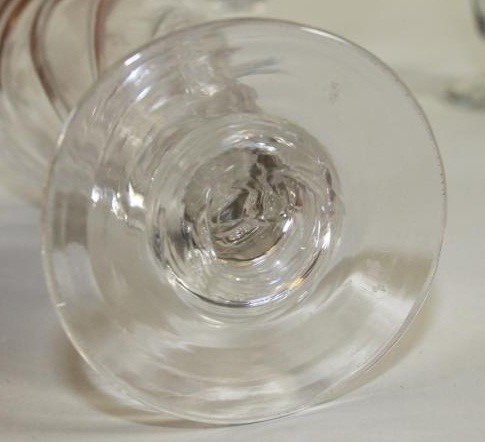 FOUR GEORGIAN AND LATER GLASSES comprising a "Somerset Ale" with wrythen fluted conical bowl Image