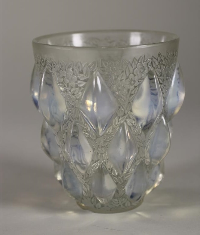 A LALIQUE BLUE OPALESCENT GLASS VASE in "Rampillon" pattern Image