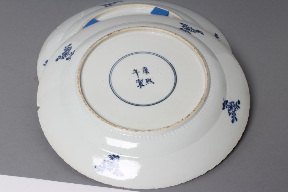A PAIR OF CHINESE PORCELAIN SMALL CHARGERS of shaped circular form Image