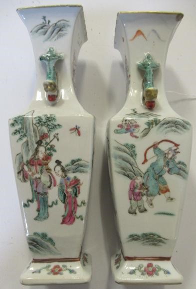 A PAIR OF CHINESE PORCELAIN VASES of baluster square section with shi-shi handles Image