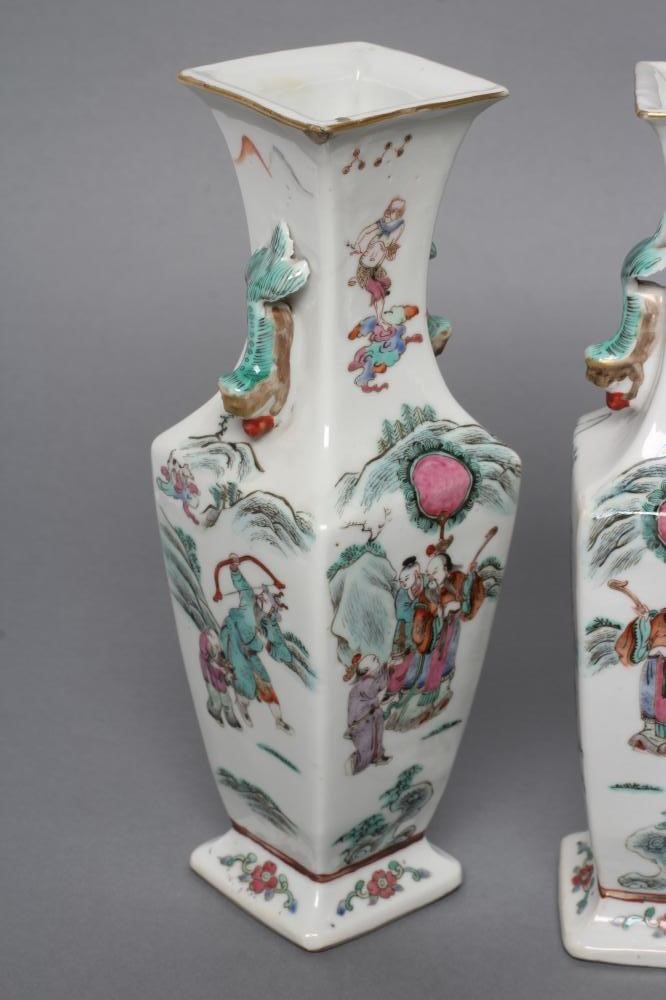 A PAIR OF CHINESE PORCELAIN VASES of baluster square section with shi-shi handles Image