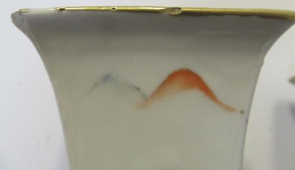 A PAIR OF CHINESE PORCELAIN VASES of baluster square section with shi-shi handles Image