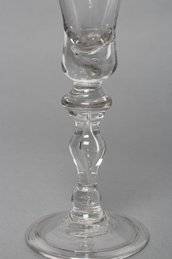 A TALL WINE GLASS Image