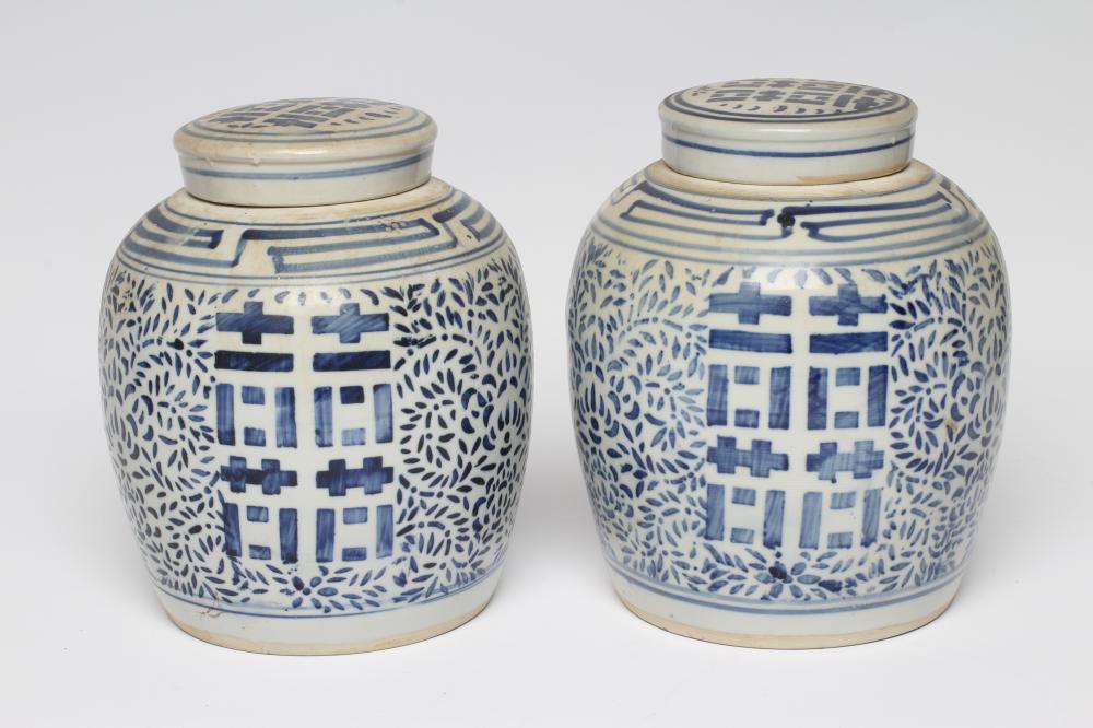 A PAIR OF CHINESE PORCELAIN JARS AND COVERS of ovoid form Image