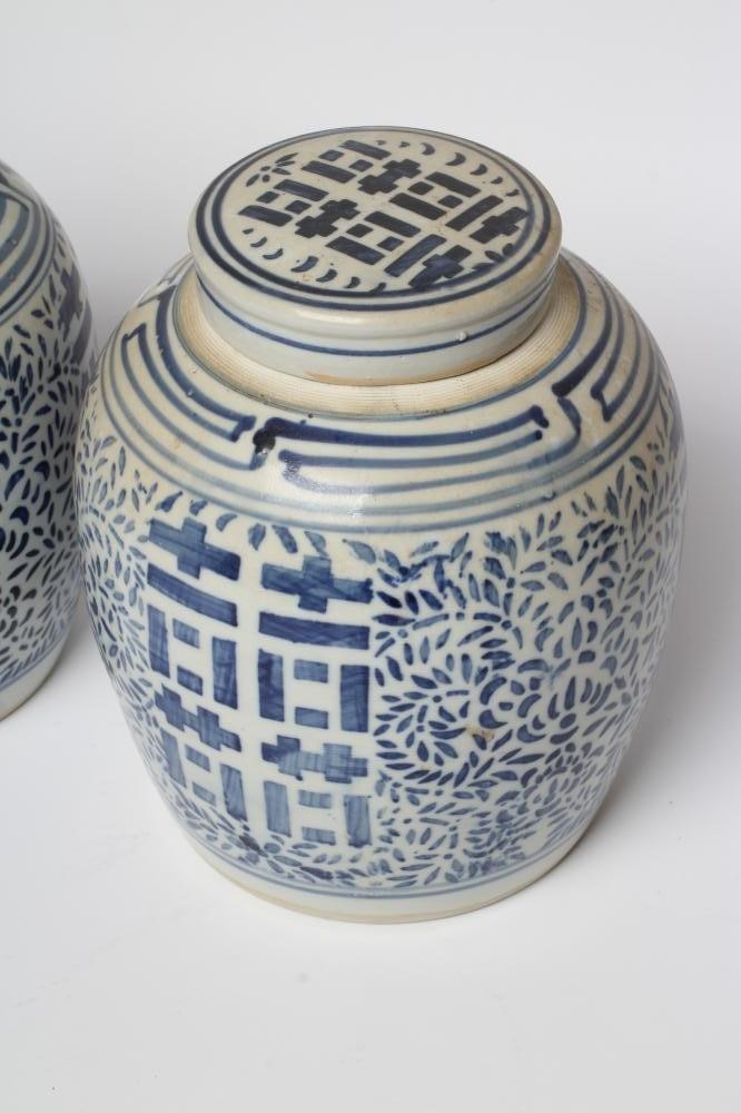 A PAIR OF CHINESE PORCELAIN JARS AND COVERS of ovoid form Image