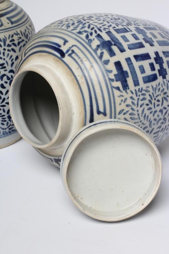 A PAIR OF CHINESE PORCELAIN JARS AND COVERS of ovoid form Image