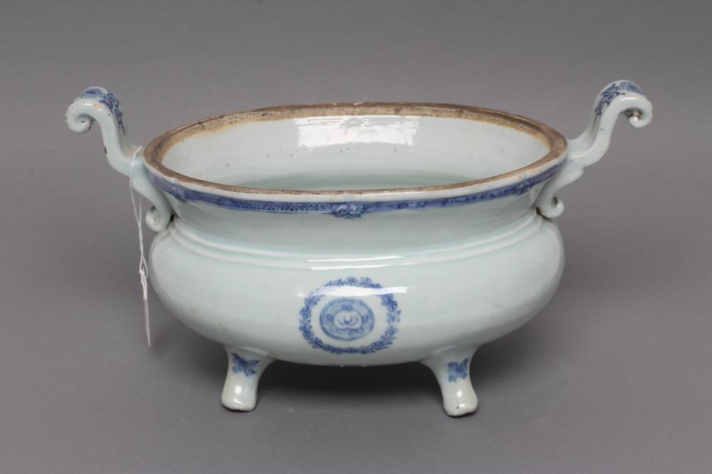 A CHINESE PORCELAIN TUREEN of squat oval form with two scroll lug handles Image