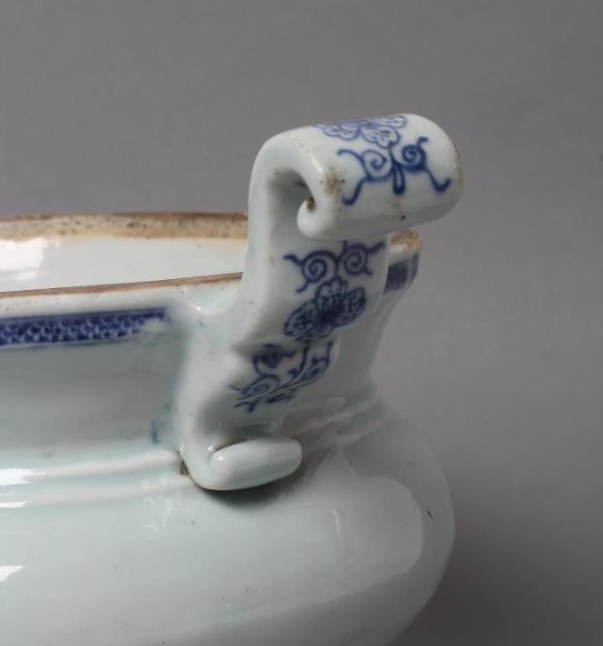 A CHINESE PORCELAIN TUREEN of squat oval form with two scroll lug handles Image
