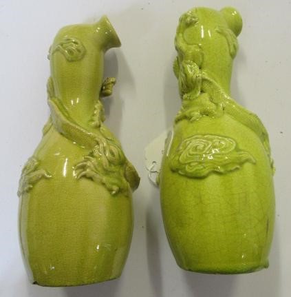 A COMPOSITE PAIR OF CHINESE EARTHENWARE EWERS of double gourd form Image