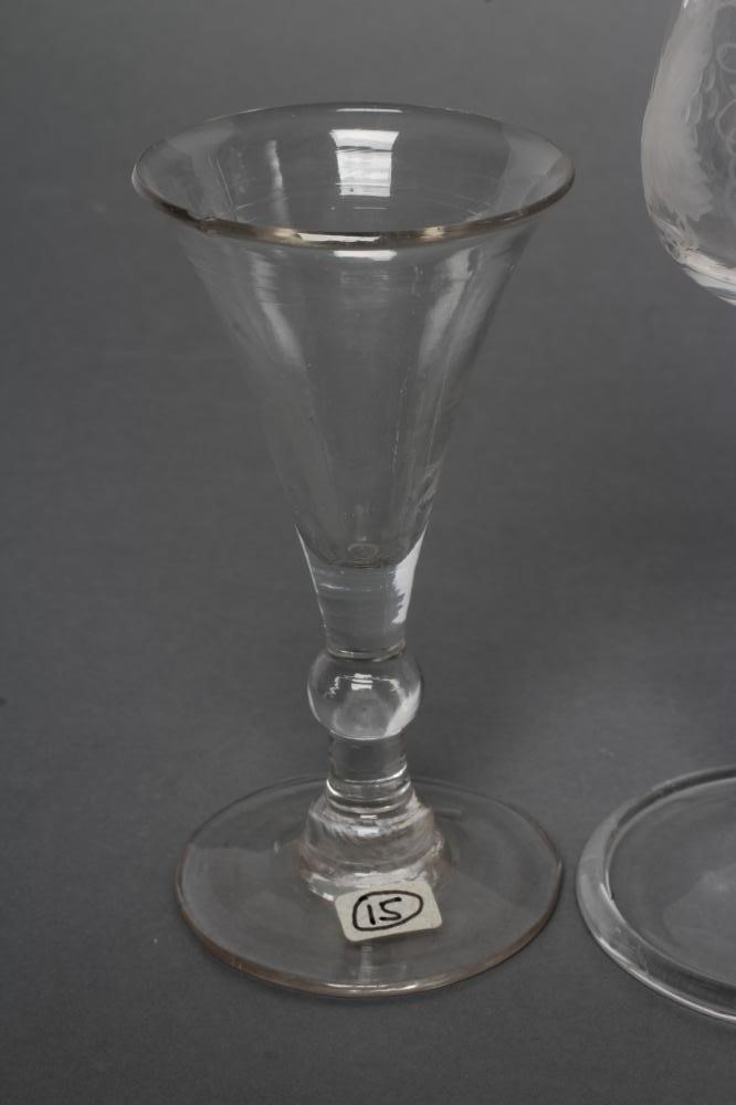 A COLLECTION OF FOUR VARIOUS GLASSES Image