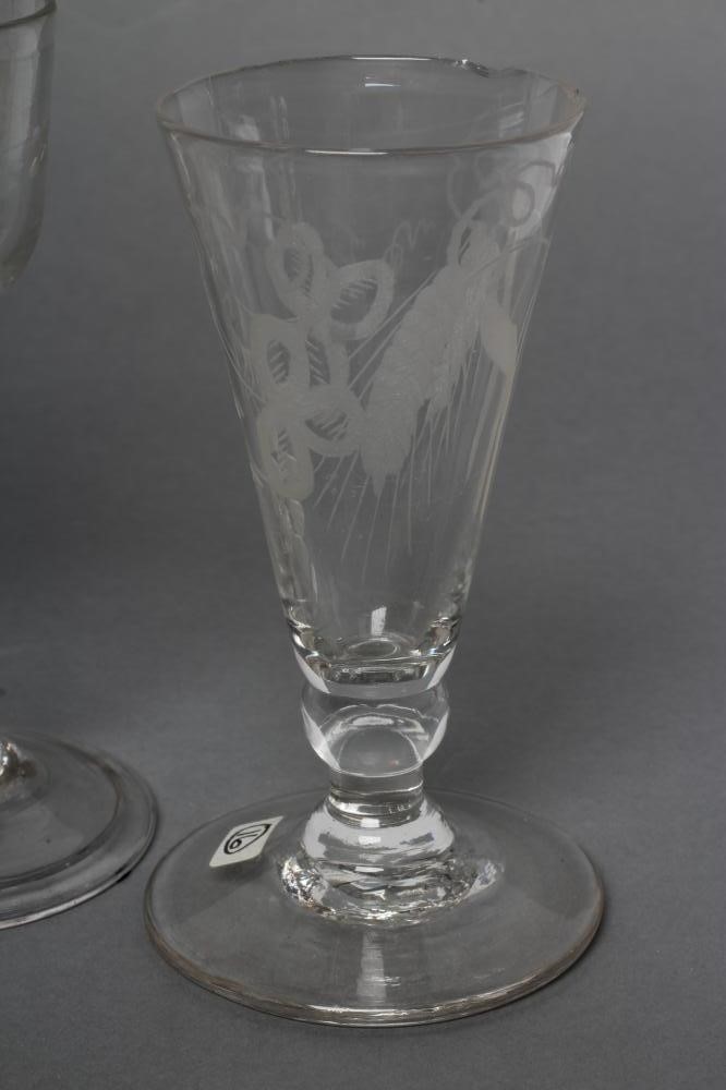 A COLLECTION OF FOUR VARIOUS GLASSES Image