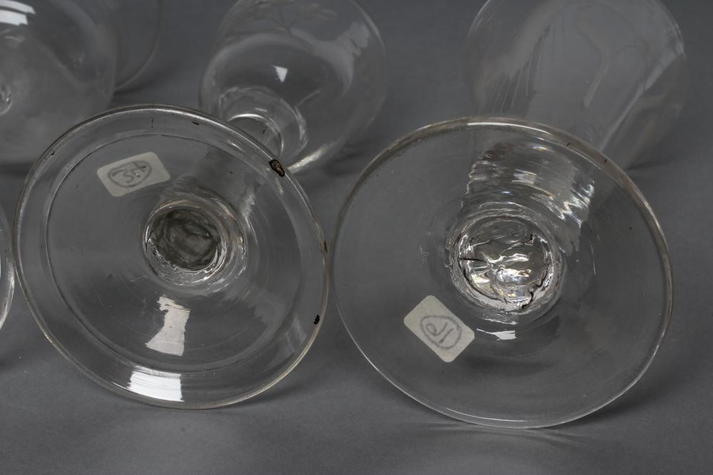A COLLECTION OF FOUR VARIOUS GLASSES Image