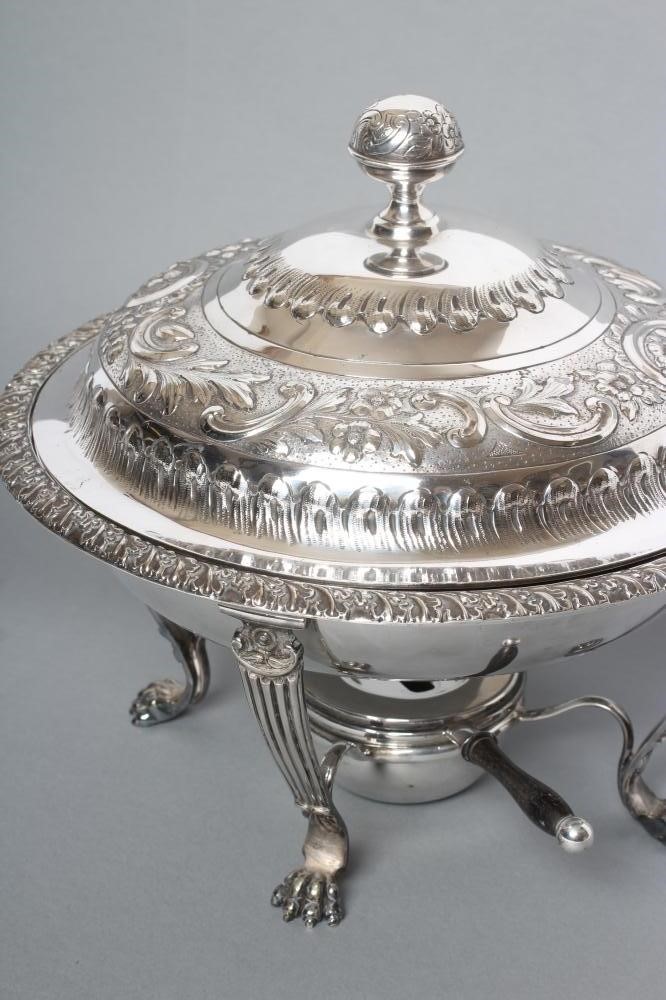 AN EDWARDIAN EPNS CHAFING DISH of circular form with everted acanthus leaf rim and angular ebony Image