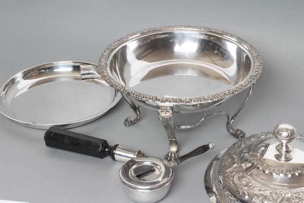 AN EDWARDIAN EPNS CHAFING DISH of circular form with everted acanthus leaf rim and angular ebony Image