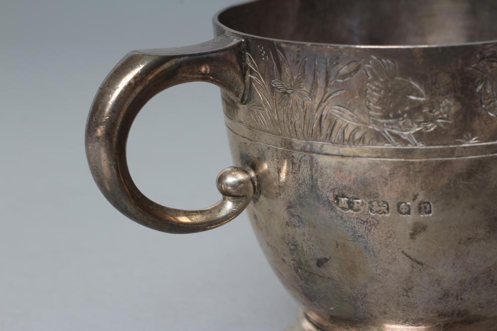 A SILVER CHRISTENING MUG Image