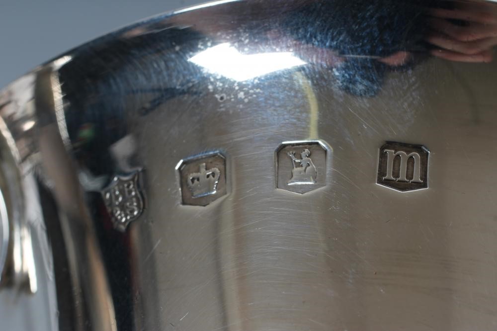 A SILVER CHRISTENING MUG Image
