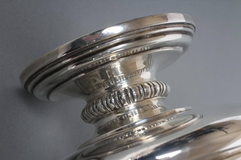 A SILVER CAMPANA URN Image