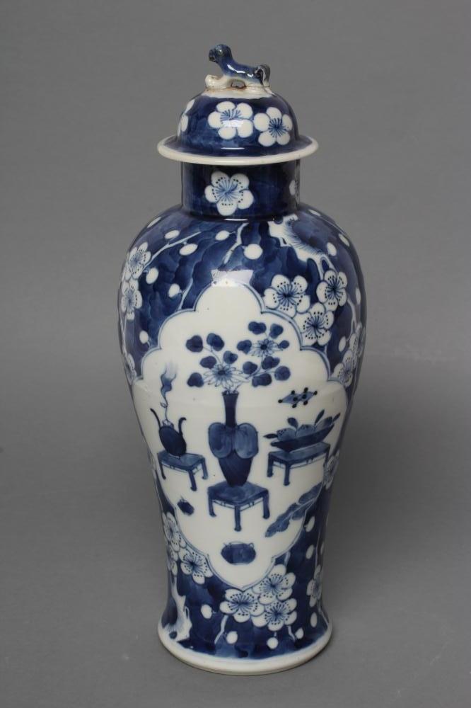 A CHINESE PORCELAIN VASE AND COVER of slender inverted baluster form Image