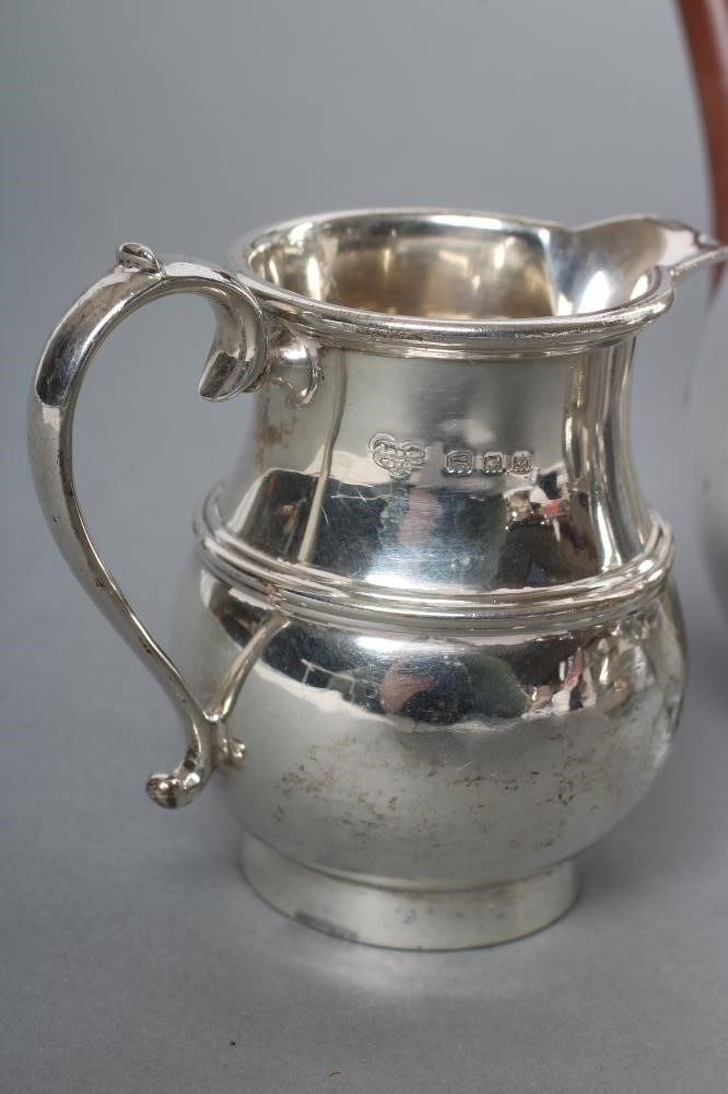 A SILVER THREE PIECE BACHELOR'S TEA SERVICE Image
