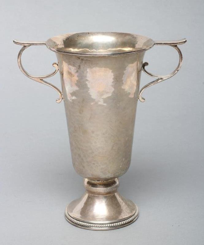 AN ARTS AND CRAFTS PLANISHED SILVER TROPHY CUP Image