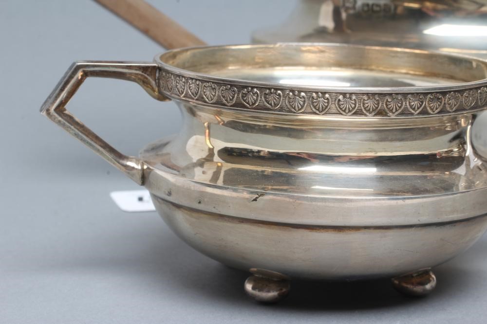 AN ART DECO THREE PIECE SILVER TEA SERVICE Image