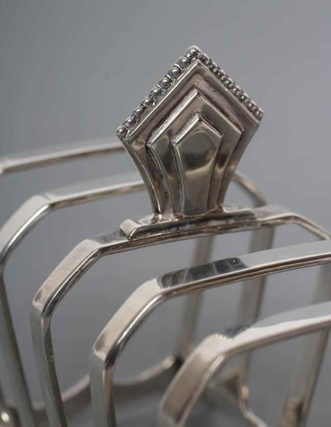A PAIR OF ART DECO SILVER FIVE BAR TOASTRACKS Image