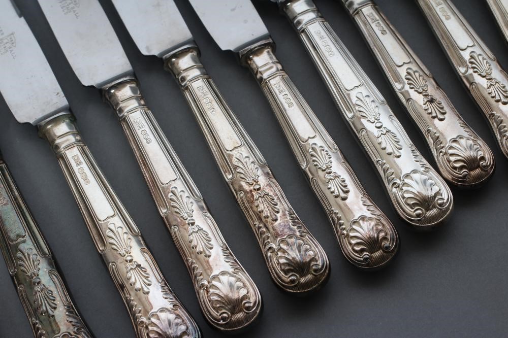 A SET OF SIX TABLE AND DESSERT KNIVES Image