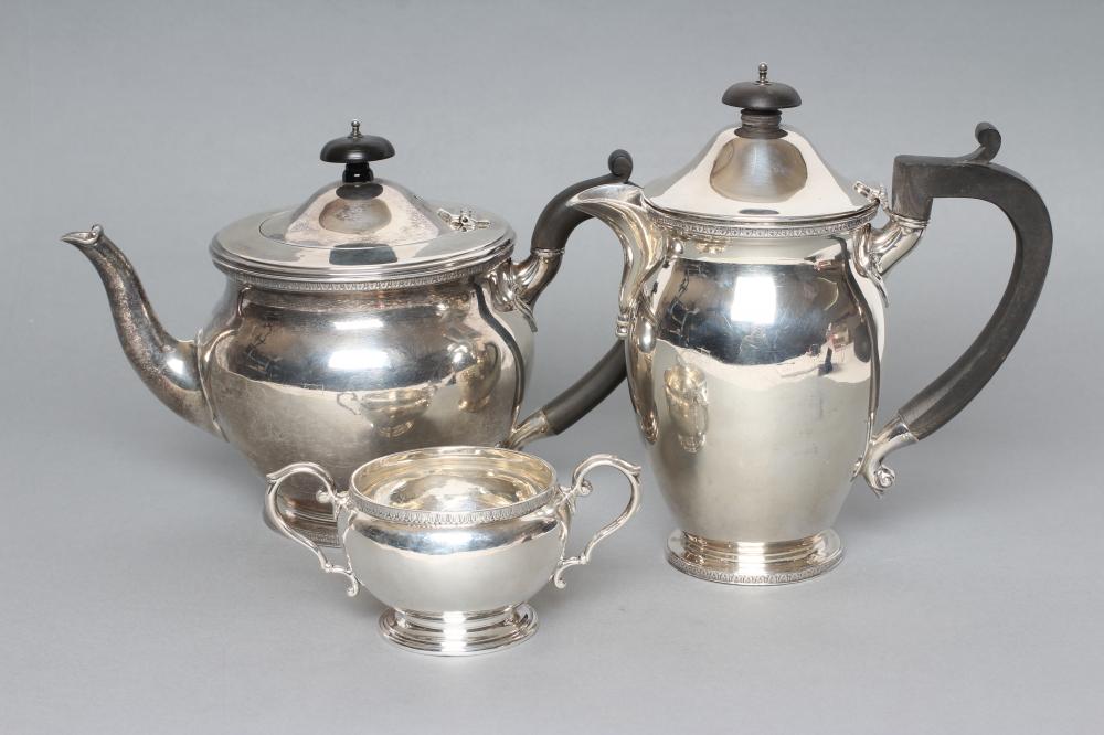 A SILVER TEA AND COFFEE POT Image