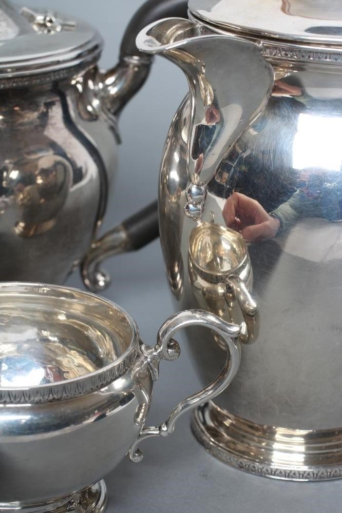 A SILVER TEA AND COFFEE POT Image