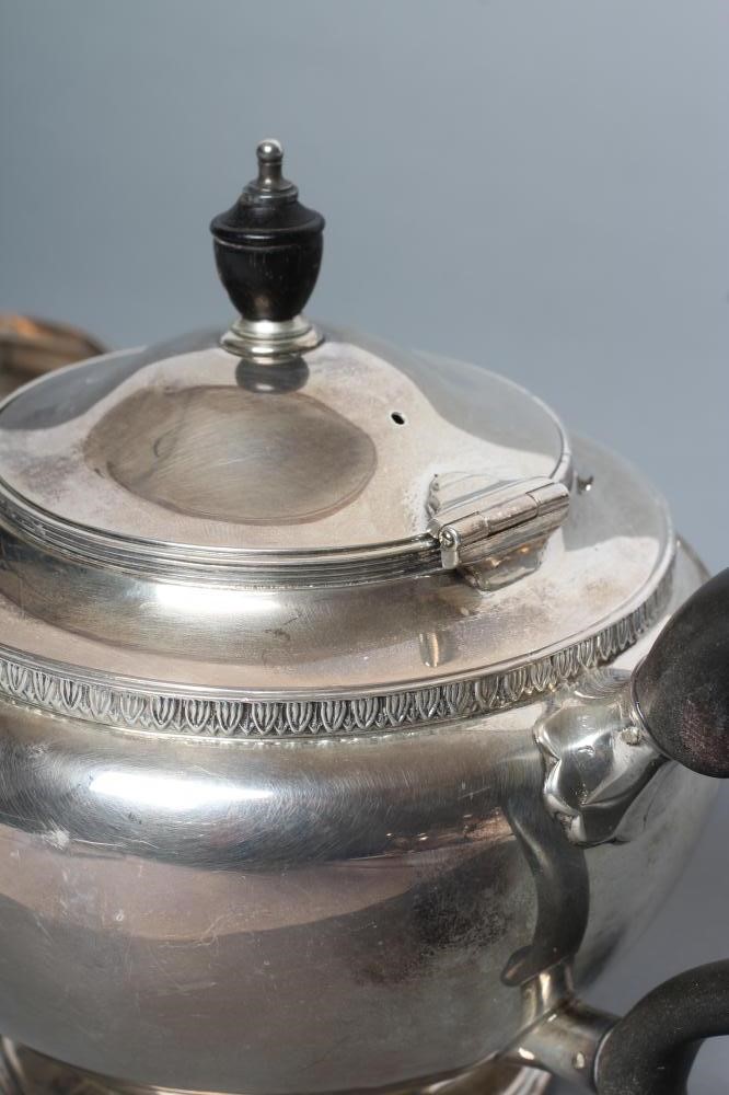 A COMPOSITE THREE PIECE SILVER TEA SERVICE Image