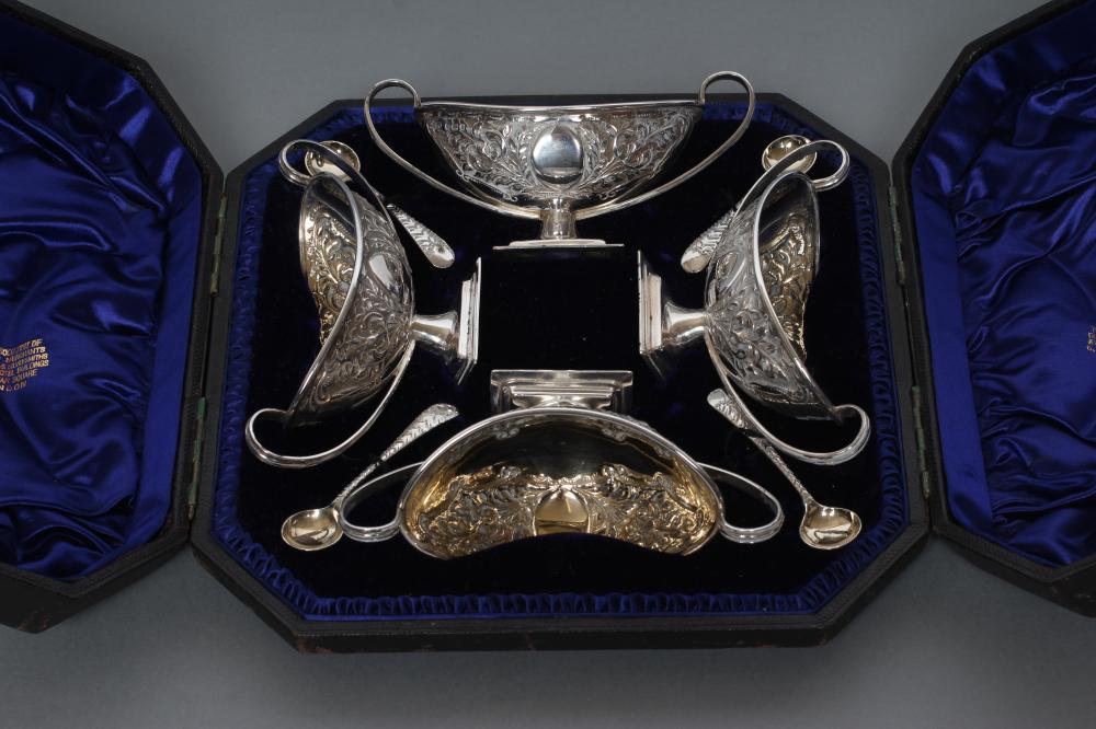 A SET OF FOUR LATE VICTORIAN SILVER PEDESTAL SALTS Image