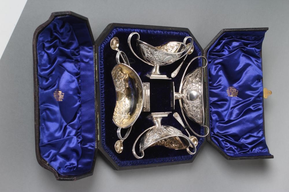 A SET OF FOUR LATE VICTORIAN SILVER PEDESTAL SALTS Image