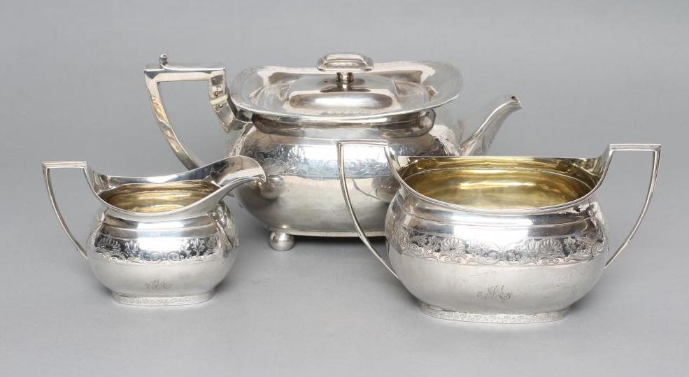 A LATE GEORGE III SILVER MATCHED THREE PIECE TEA SERVICE Image