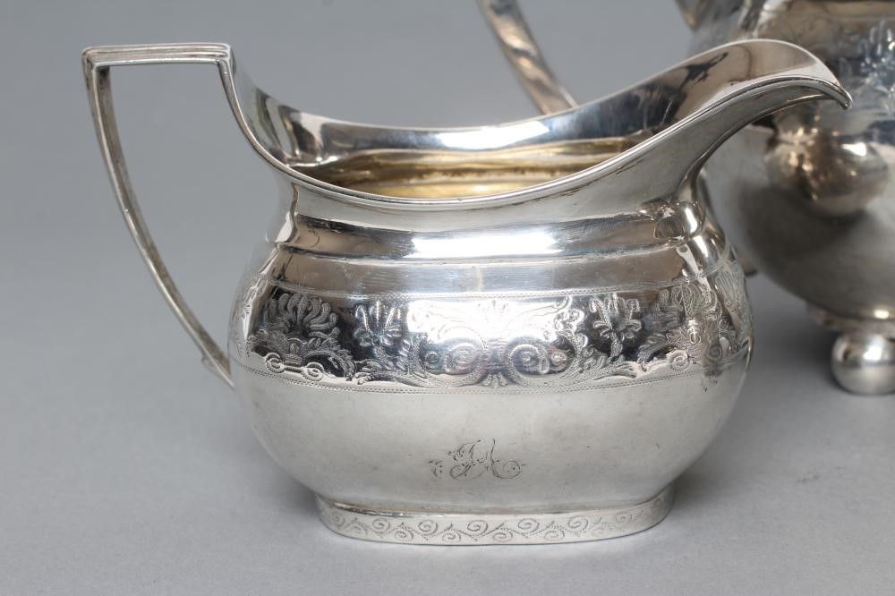 A LATE GEORGE III SILVER MATCHED THREE PIECE TEA SERVICE Image