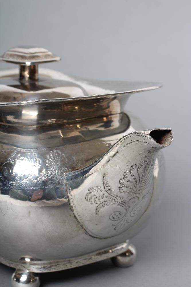 A LATE GEORGE III SILVER MATCHED THREE PIECE TEA SERVICE Image