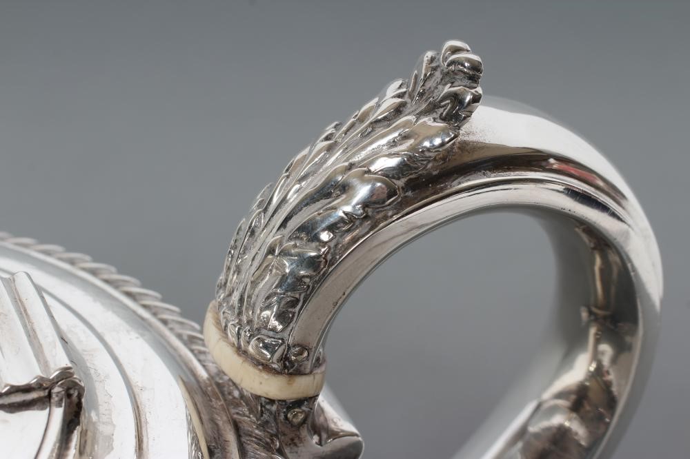 A COMPOSITE WILLIAM IV SILVER THREE PIECE TEA SERVICE Image