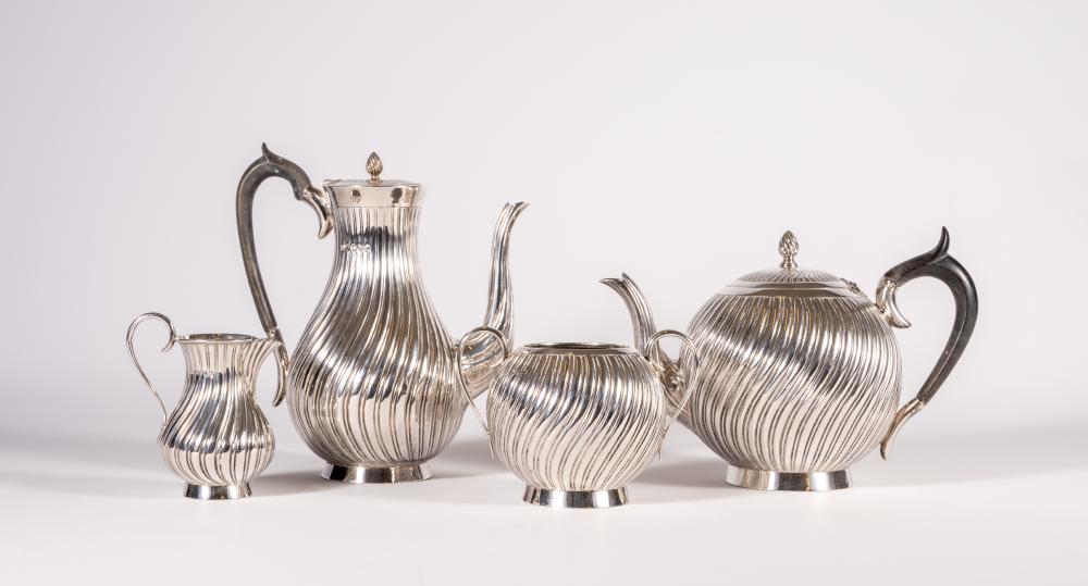 A COMPOSITE VICTORIAN SILVER FOUR PIECE TEA AND COFFEE SERVICE Image