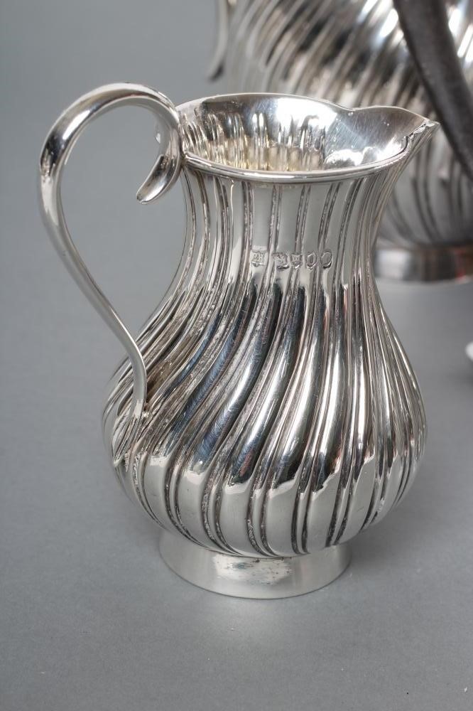 A COMPOSITE VICTORIAN SILVER FOUR PIECE TEA AND COFFEE SERVICE Image