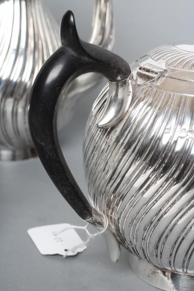 A COMPOSITE VICTORIAN SILVER FOUR PIECE TEA AND COFFEE SERVICE Image