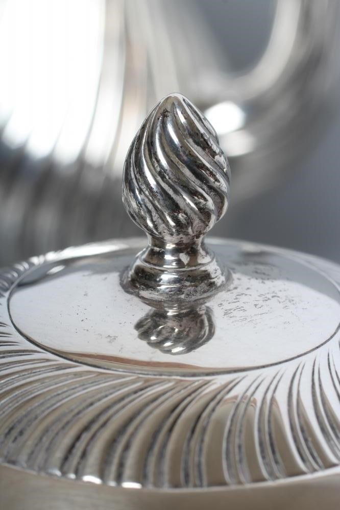 A COMPOSITE VICTORIAN SILVER FOUR PIECE TEA AND COFFEE SERVICE Image