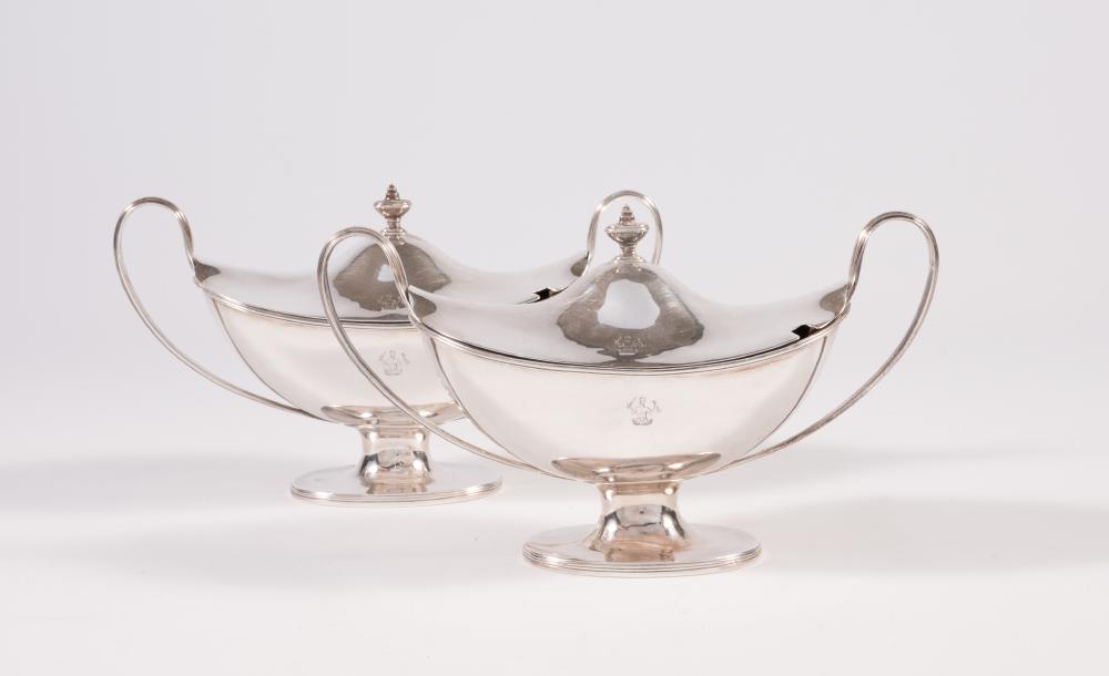A PAIR OF GEORGE III SILVER SAUCE TUREENS AND COVERS Image