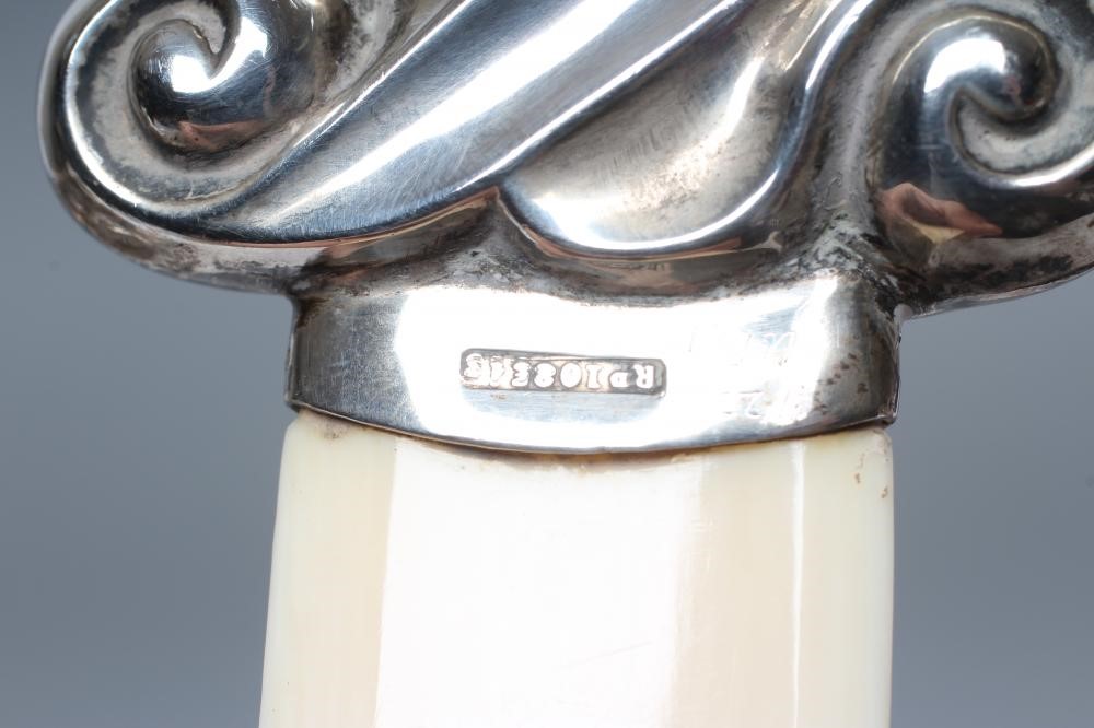 A SILVER MOUNTED IVORY PAGE TURNER Image