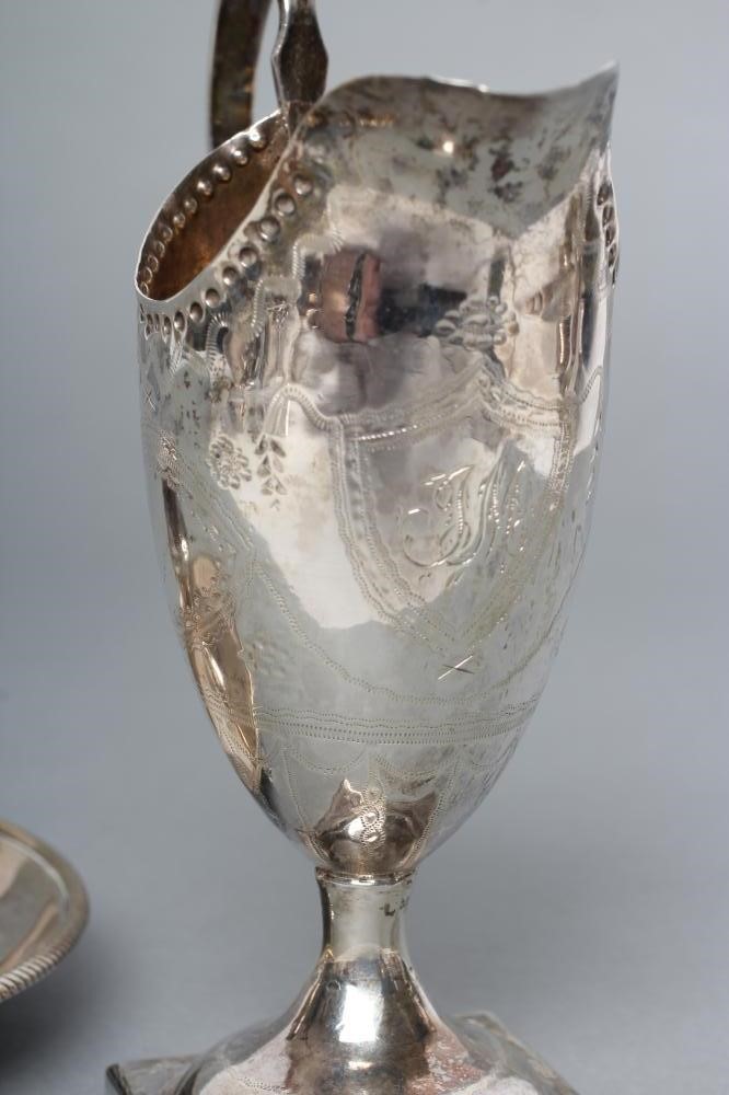 A GEORGE III SILVER CHAMBERSTICK Image
