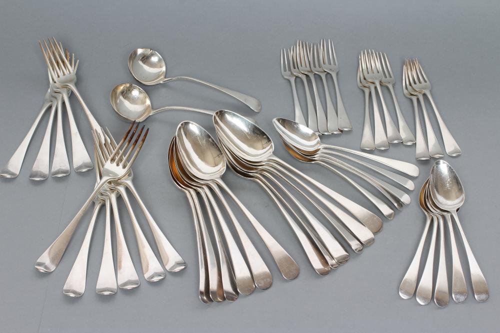 A MATCHED AND COMPOSITE GEORGE III SILVER TABLE SERVICE Image