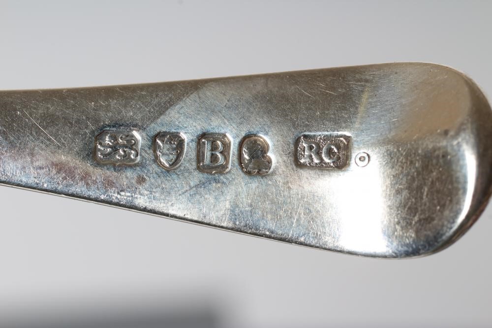 A MATCHED AND COMPOSITE GEORGE III SILVER TABLE SERVICE Image