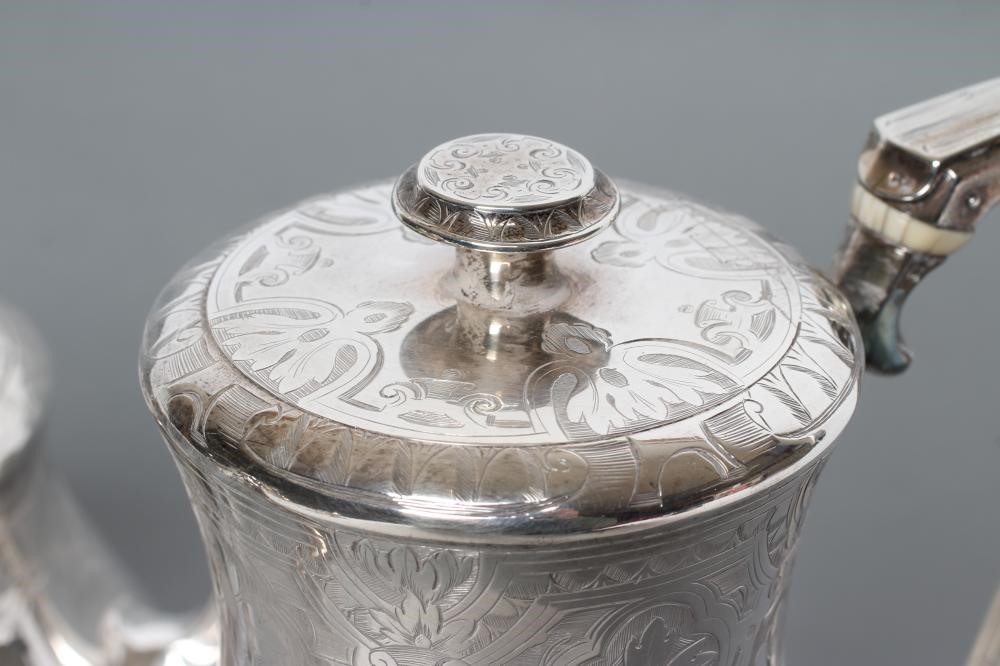 A VICTORIAN SILVER FOUR PIECE TEA AND COFFEE SERVICE Image