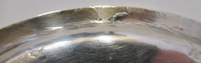 A QUEEN ANNE IRISH SILVER FOOTED WAITER Image