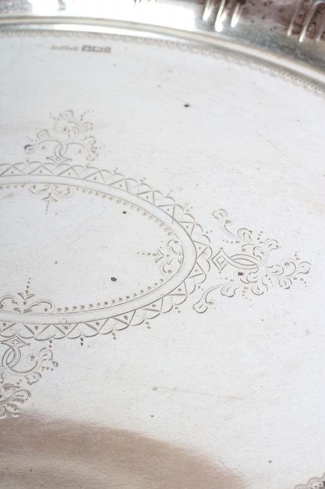 A LATE VICTORIAN SILVER DRESSING TABLE TRAY Image
